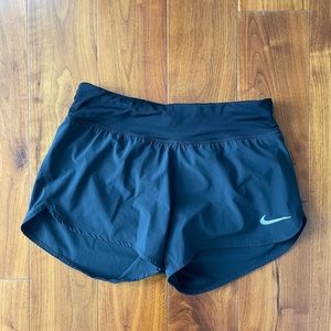 Black Nike running shorts • size medium